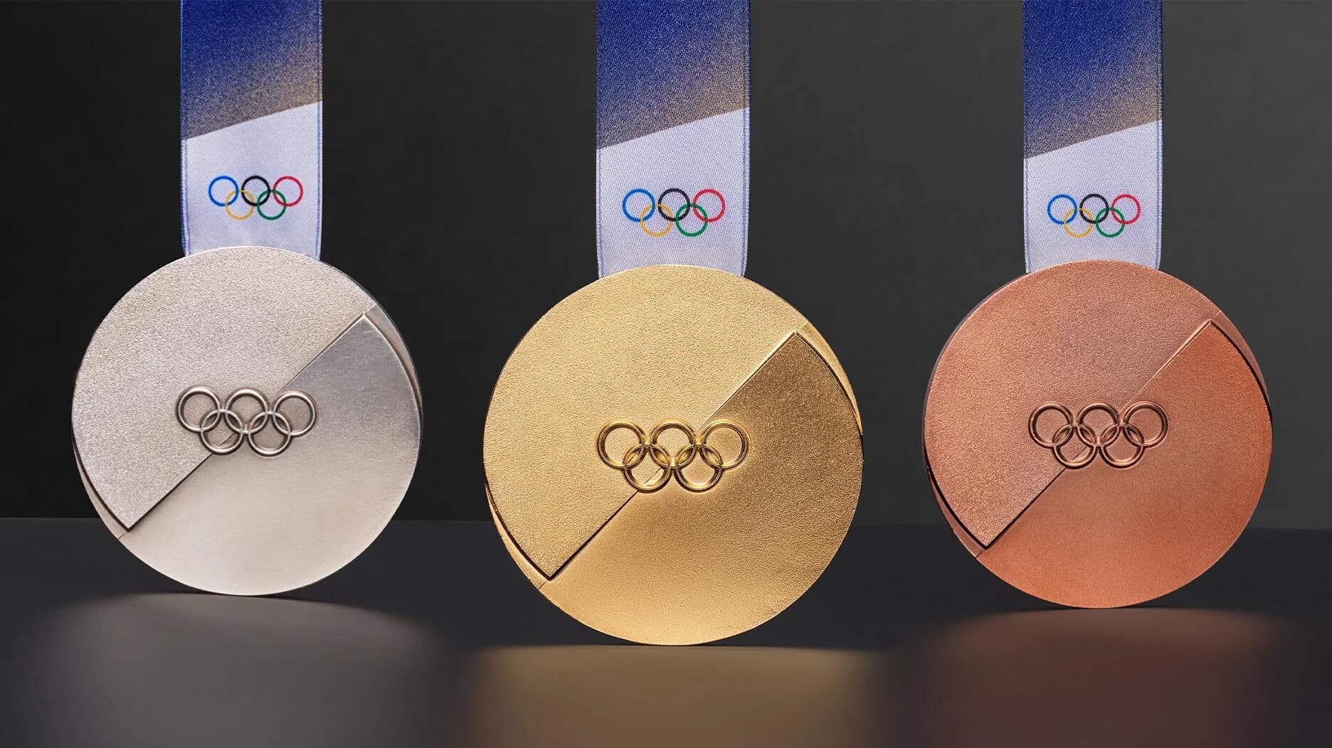 2026 Winter Olympic Medal Design Symbolizes Unity | National Jeweler